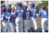 Standing outside of the South Portico, the Uniondale Little League Sluggers gather together before walking to the field. Prior to the game, the two teams and their guests toured the White House Sunday, May 5, 2002.