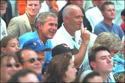 President Bush attends a Tee Ball on the South Lawn game between the Cardinals and the South Berkeley Little League Braves from Inwood, West Virginia, June 23, 2002.