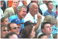 President Bush attends a Tee Ball on the South Lawn game between the Cardinals and the South Berkeley Little League Braves from Inwood, West Virginia, June 23, 2002.