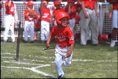 President George W. Bush attends a Tee Ball on the South Lawn game between the Cardinals and the South Berkeley Little League Braves from Inwood, West Virginia. June 23, 2002.