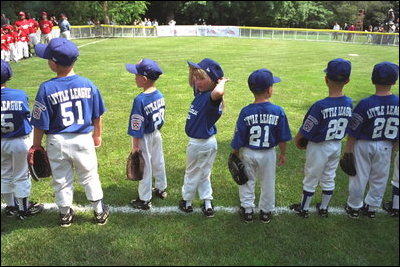 President Bush attends a Tee Ball on the South Lawn game between the Cardinals and the South Berkeley Little League Braves from Inwood, West Virginia, June 23, 2002.