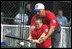 President George W. Bush hosts a White House Tee Ball (t-ball) game on the South Lawn between the Waynesboro, Virginia Little League Challenger Division Sand Gnats (Blue Team) vs. the East Brunswick, New Jersey Babe Ruth Buddy Ball League Sluggers (Red Team) September 22, 2002.