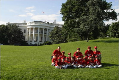 President George W. Bush and Mrs. Bush hosts Tee Ball on the South Lawn with The Fort Belvoir Little League Braves of Fort Belvoir, Virginia and the Naval Base Little League Yankees of Norfolk, Virginia, June 23, 2003.