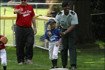 President George W. Bush and Mrs. Bush hosts Tee Ball on the South Lawn with The Fort Belvoir Little League Braves of Fort Belvoir, Virginia and the Naval Base Little League Yankees of Norfolk, Virginia, June 23, 2003.