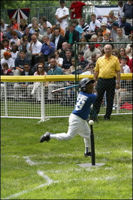 President George W. Bush and Mrs. Bush hosts Tee Ball on the South Lawn with The Fort Belvoir Little League Braves of Fort Belvoir, Virginia and the Naval Base Little League Yankees of Norfolk, Virginia, June 23, 2003.