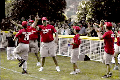 President George W. Bush hosts Tee Ball on the South Lawn with The Oriole Advocates Challengers of Marley Area Little League of Glen Burnie, Maryland and The Ridley Police Challengers of Leedom Little League, Ridley Park, Pennsylvania, July 27, 2003.