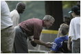 President George W. Bush hosts Tee Ball on the South Lawn with The Oriole Advocates Challengers of Marley Area Little League of Glen Burnie, Maryland and The Ridley Police Challengers of Leedom Little League, Ridley Park, Pennsylvania, July 27, 2003.