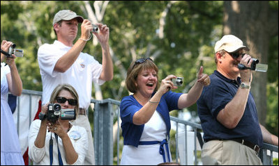  Families root for their kids as they also document the All-Star tee-ball action at the White House, July 16, 2008 – a hot Wednesday afternoon in Washington, D.C. One child represented each state and the District of Columbia in the action on the South Lawn, which was attended by both President George W. Bush and Mrs. Laura Bush.