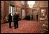 Vice President Dick Cheney talks with Antonio Malaschini, Secretary General of the Italian Senate, center, and Marcello Pera, President of the Italian Senate, right, during a reception in the Palazzo Giustiniani in Rome Jan. 26, 2004.