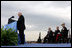 President George W. Bush, Secretary of Defense Donald Rumsfeld, and Chairman of the Joint Chiefs of Staff General Peter Pace laugh as Vice President Dick Cheney makes a joke during his remarks at the Armed Forces Full Honor Review in Honor of Secretary of Defense Donald Rumsfeld at the Pentagon, Friday, December 15, 2006.