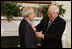 Vice President Dick Cheney presents the Distinguished Service Cross to Lieutenant Bernard W. Bail in the Roosevelt Room at the White House, Friday, February 24, 2006. The Distinguished Service Cross is awarded to a person who while serving in any capacity with the U.S. Army distinguished himself or herself by extraordinary heroism. After Lt. Bail’s aircraft took heavy anti-aircraft fire that killed the pilot and wounded other crew members over the English Channel on June 5, 1944, Lt. Bail displayed such acts of valor and ultimately prevented the aircraft, loaded with a full ordnance, from crashing into an English village.