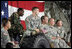 Soldiers from the Iowa Air and Army National Guard listen as Vice President Dick Cheney delivers remarks, Monday, July 17, 2006, at Camp Dodge in Johnston, Iowa. Camp Dodge, home of the National Maintenance Training Center, trains all of the Army, Army National Guard and Army Reserve maintenance companies in the United States.