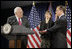 Vice President Dick Cheney swears in Steven Preston as the Administrator of the Small Business Administration during a ceremony at the Offices of the Small Business Administration in Washington, D.C., Wednesday, July 26, 2006. Preston’s wife, Molly, holds the Bible.