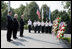 Vice President Dick Cheney stands with Secretary of the Interior Dirk Kempthorne, right, and South Korean Ambassador to the U.S. Tae Sik Lee, left, during a moment of silence after placing a wreath at the Korean War Memorial in Washington, D.C. to commemorate Korean War Veterans Armistice Day, Thursday, July 27, 2006. Today marks the 53rd anniversary of the end of the Korean War.