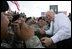 Vice President Dick Cheney shakes hands and poses for photographs with soldiers from the Army’s 3rd Infantry Division during a rally at Fort Stewart, Ga., Friday, July 21, 2006.