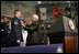 Vice President Dick Cheney pins the Purple Heart Medal onto Master Sergeant Henry G. Christle, Jr., Monday, July 10, 2006, during a rally for the Michigan National Guard and Joint Services at Selfridge Air National Guard Base in Harrison Township, Mich. Master Sergeant Christle was wounded in action on March 23, 2004 while serving as a Special Operations Weather Team Forecaster and Observer assigned to the Combined Joint Special Operations Task Force 180, Afghanistan.