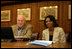 Vice President Dick Cheney and Secretary of State Condoleezza Rice smile while participating in a video teleconference from Camp David, Md. with President Bush and Iraqi Prime Minister Nouri al-Maliki in Baghdad, Tuesday, June 13, 2006.