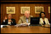 Vice President Dick Cheney is seated with Secretary of State Condoleezza Rice and Secretary of Defense Donald Rumsfeld as they participate in a video teleconference from Camp David, Md., Tuesday, June 13, 2006 with President Bush and Iraqi Prime Minister Nouri al-Maliki in Baghdad.