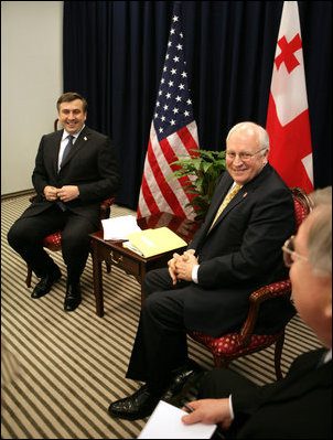 Vice President Dick Cheney and President Mikheil Saakashvili of Georgia, share a light moment with U.S. Ambassador John Tefft, right, during a bilateral meeting held during the Vilnius Conference 2006 in Vilnius, Lithuania, Thursday, May 4, 2006.