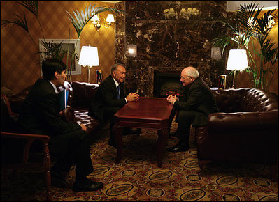 With the aid of an interpreter Vice President Dick Cheney and Kazakh President Nursultan Nazarbayev spend a final moment to talk alone before concluding meetings in Astana, Kazakhstan, Friday, May 5, 2006. 