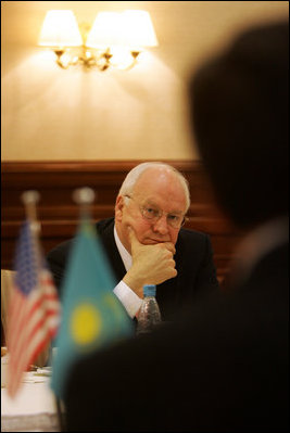 Vice President Dick Cheney listens as leaders of Kazakh opposition political parties share their ideas regarding political and economic reform and the advancement of democracy in Kazakhstan, Saturday, May 6, 2006, during a breakfast meeting in Astana. 