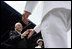 Vice President Dick Cheney greets each graduate as they receive their diplomas during the U.S. Naval Academy graduation in Annapolis, Maryland, Friday, May 27, 2005. During the ceremony the Vice President delivered the commencement address to the Class of 2006 and said, "As of today, you, the Custodians of Liberty, will begin writing your own chapter of excellence and achievement for the United States Armed Forces. As military officers you will bring relief to the helpless, hope to the oppressed. You will protect the United States of America in a time of war, and you'll help to build the peace that freedom brings.