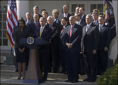 President George W. Bush and Vice President Dick Cheney stand with the President's Cabinet during a Rose Garden address to the media. "As the new members of Congress and their leaders return to Washington, I've instructed my Cabinet to provide whatever briefings and information they need to be able to do their jobs," said the President. "The American people expect us to rise above partisan differences, and my administration will do its part."