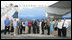 Vice President Dick Cheney stands in front of Air Force Two with students and faculty of the Dean Morgan Leadership Program from Dean Morgan Junior High School, Monday, October 2, 2006 at Natrona County International Airport in Casper, Wyo. The Dean Morgan Leadership Program provides students with the opportunity to meet leaders in fields including business, the arts, medicine, volunteerism, government and military service. Earlier in the day the Vice President participated in a campaign fundraising event in Casper for Wyoming Congresswoman Barbara Cubin.