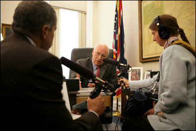 Vice President Dick Cheney talks with Juan Williams, left, of National Public Radio during a taped radio interview in the Vice President's office during the White House Radio Day, Tuesday, October 24, 2006.