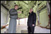 Vice President Dick Cheney stands in the bomb bay of a B-2 Stealth bomber with Lt. Col. Bill Eldridge, left, during a tour at Whiteman Air Force Base, Missouri, Friday, October 27, 2006.