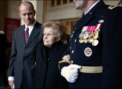 Former first lady Betty Ford is escorted by her son Steve Ford and Major General Guy Swan III following the State Funeral service for former President Gerald R. Ford at the National Cathedral in Washington, D.C., Tuesday, January 2, 2007.