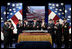 Vice President Dick Cheney, second left, is joined by government officials and family members of former President Gerald R. Ford in applause during a naming ceremony for the new U.S. Navy aircraft carrier, USS Gerald R. Ford, at the Pentagon in Washington, D.C., Tuesday, Jan. 16, 2007. The nuclear-powered aircraft carrier will be the first in the new Gerald R. Ford class of aircraft carriers in the U.S. Navy. Pictured from left to right are Secretary of the Navy Donald Winter, Vice President Dick Cheney, Susan Ford Bales, Steve Ford, Jack Ford, Michael Ford, Senator John Warner, R-Va., Senator Carl Levin D-Mich., and Chief of Naval Operations, Admiral Mike Mullen.