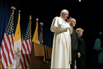 Pope Benedict XVI is joined by Vice President Dick Cheney and Mrs. Lynne Cheney for a farewell ceremony in honor of the Pope, Sunday, April 20, 2008 at John F. Kennedy International Airport in New York. During the ceremony the Vice President said, "Your presence has honored our country. Although you must leave us now, your words and the memory of this week will stay with us. For that, we are truly and humbly grateful."