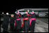 Vice President Dick Cheney and Mrs. Lynne Cheney are joined by clergy as they wave to the departing Alitalia airliner carrying Pope Benedict XVI from JFK Airport Sunday, April 20, 2008, in New York. The Pope later landed safely in Rome, capping a six-day visit to the United States.