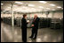 Marking the first day of mass production of economic stimulus checks, Vice President Dick Cheney tours the Philadelphia Regional Financial Center with Director Betty Belinsky, Thursday, May 8, 2008, in Philadelphia.