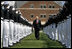 Vice President Dick Cheney walks through an honor cordon of U.S. Coast Guard cadets, Wednesday, May 21, 2008, upon his arrival to the U.S. Coast Guard Academy commencement ceremony in New London, Conn.