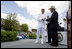 Vice President Dick Cheney presents commission papers to a U.S. Coast Guard Academy graduate, Wednesday, May 21, 2008, during commencement exercises in New London, Conn. During his address to the graduates the Vice President said, "This branch of the armed forces has given steady service to the United States of America since the year 1790 -- and in that time the Coast Guard has saved more than a million lives." He added, "As you step forward to accept new duties, your fellow citizens look up to you for the oath you take, the traditions you uphold, and the standards you live by."