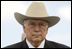 Vice President Dick Cheney stands with hand over heart for the playing of the national anthem, Wednesday, May 21, 2008, during the U.S. Coast Guard Academy commencement ceremony in New London, Conn.