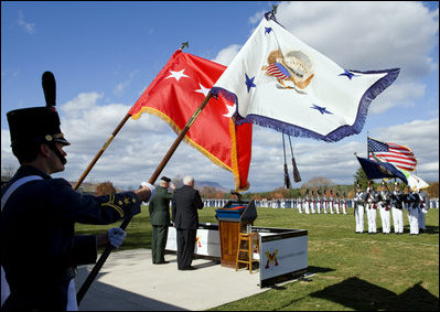 Vice President Dick Cheney is joined by Virginia Military Institute Superintendent General J.H. Binford Peay III, center left, for the posting of the colors Saturday, Nov. 8, 2008, during a parade by the VMI Corps of Cadets in Lexington, Va.