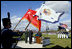 Vice President Dick Cheney is joined by Virginia Military Institute Superintendent General J.H. Binford Peay III, center left, for the posting of the colors Saturday, Nov. 8, 2008, during a parade by the VMI Corps of Cadets in Lexington, Va.