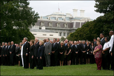 President George W. Bush and Mrs. Laura Bush stand with Vice President Dick Cheney and Mrs. Lynne Cheney and staff, family and friends Thursday, Sept. 11, 2008, in a South Lawn observance of the seventh anniversary of the September 11 terrorist attacks.