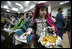 Local children participate in the opening session of the Afghan Parliament, the first elected parliament in more than three decades, in Kabul, Afghanistan Monday, Dec. 19, 2005.