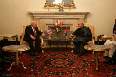 Vice President Dick Cheney and a US delegation meet with Afghan President Hamid Karzai after attending the opening session of the Afghan Parliament, the first elected parliament in more than three decades, in Kabul, Afghanistan Monday, Dec. 19, 2005.