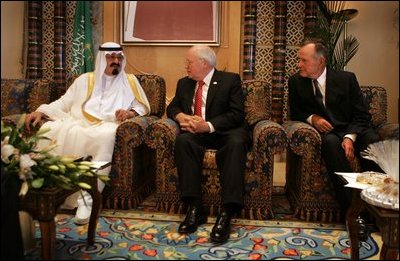 Vice President Dick Cheney and former President George H.W. Bush talk with newly crowned King Abdullah of Saudi Arabia, following the recent death of King Fahd, Friday, August 05, 2005. The vice president led a delegation to pay respects and offer condolences.