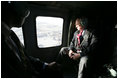 Vice President Dick Cheney travels via Blackhawk helicopter to Baghdad International Airport for a one-day surprise visit to Iraq, Sunday Dec. 18, 2005.