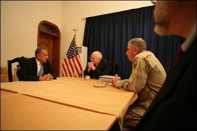 Vice President Cheney meets with US Ambassador to Iraq Zalmay Khalilzad, General George Casey and General John Abizaid in the Green Zone during a one-day surprise visit to Iraq, Sunday Dec. 18, 2005.