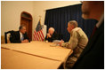 Vice President Cheney meets with US Ambassador to Iraq Zalmay Khalilzad, General George Casey and General John Abizaid in the Green Zone during a one-day surprise visit to Iraq, Sunday Dec. 18, 2005.