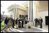 Vice President Dick Cheney, accompanied by US Ambassador to Iraq Zalmay Khalilzad, takes questions from the press following a meeting inside the Green Zone with General George Casey and General John Abizaid, Sunday Dec. 18, 2005.