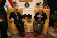 Vice President Dick Cheney meets with Iraqi Prime Minister Jafari, US Ambassador to Iraq Zalmay Khalilzad, and US delegation members inside the Green Zone, Sunday Dec. 18, 2005.