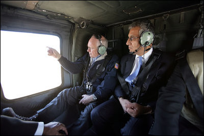 Vice President Dick Cheney and Zalmay Khalilzad, Ambassador to Iraq, depart from Taji Air Base at the 9th Infantry Division Headquarters via helicopter, Sunday Dec. 18, 2005.